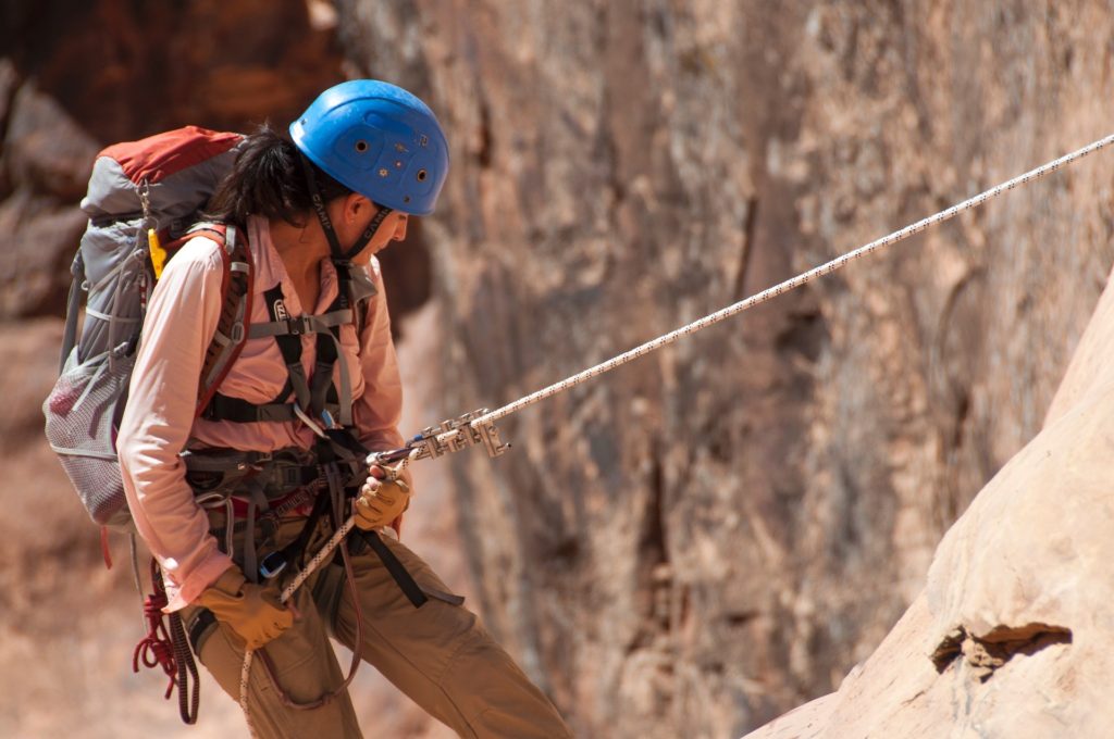 Rock Climbing Woman with Helmet