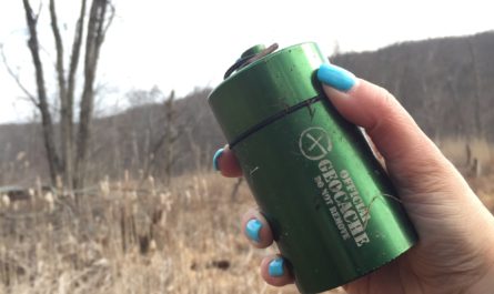 Geocache in hand