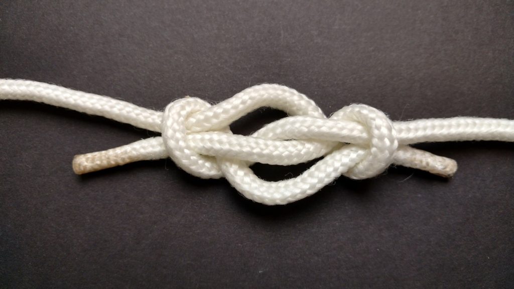Small white rope tied in knot