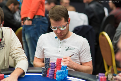 Poker player taking notes during game