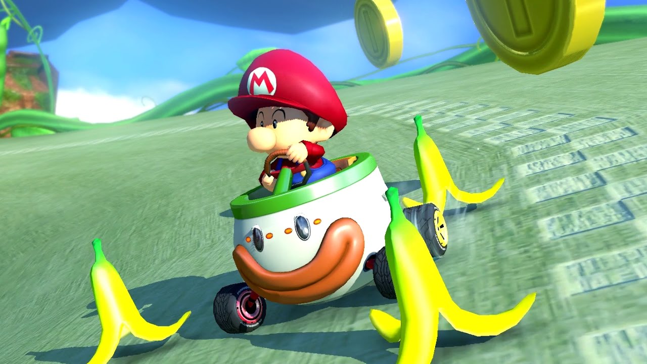 Baby Mario surrounded by banana peels in Mario Kart 8